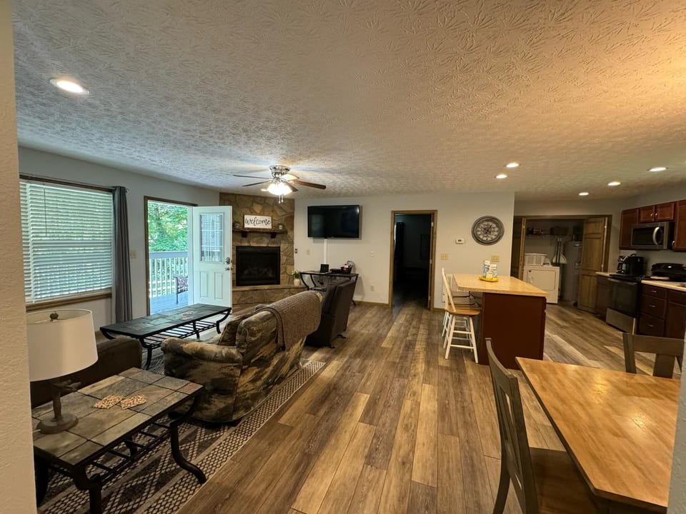 Living room, blu-ray player, dvds, board games, 55" TV with Comcast TV