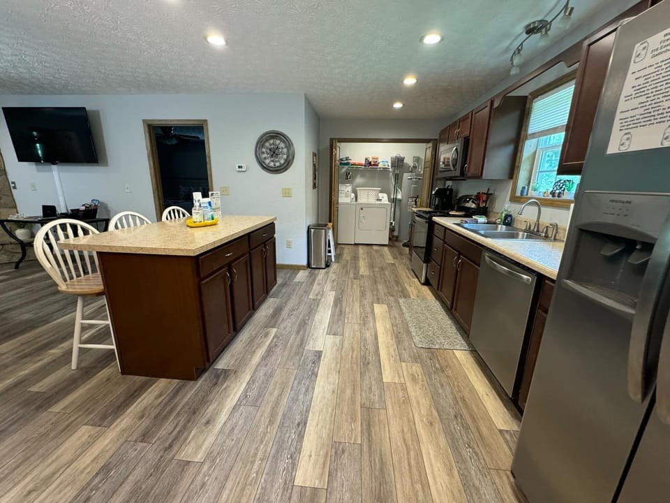 Washer and dryer off of kitchen