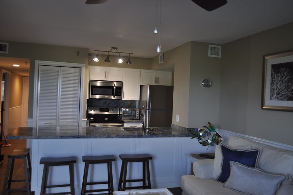 Kitchen with large Blue Bahia Counter