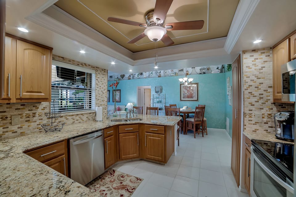 Kitchen w/ Convection Oven, large Refrigerator, Dish washer, Microwave, &Granite