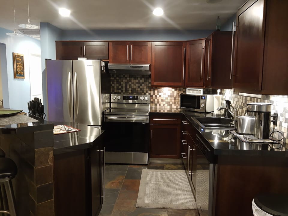 kitchen with island and two barstools 