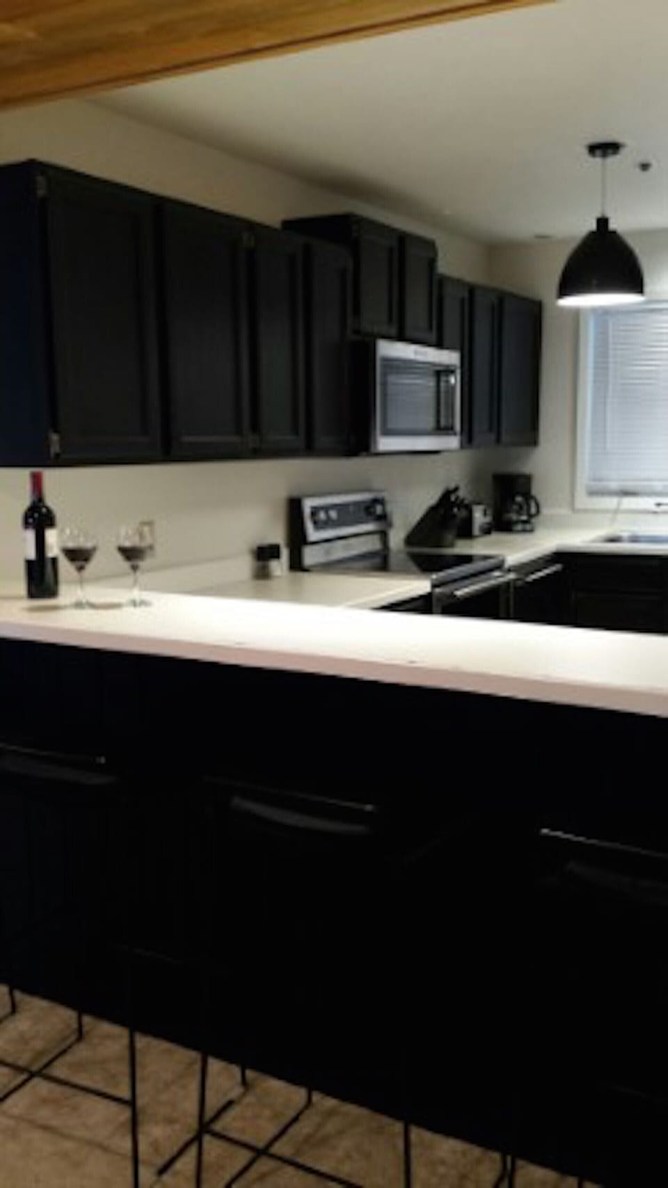 All new stainless appliances in the full kitchen with breakfast bar