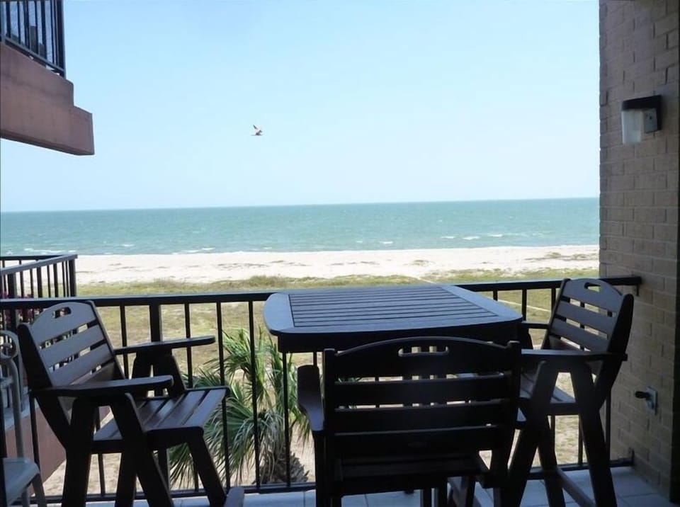 Dine on the patio overlooking the water
