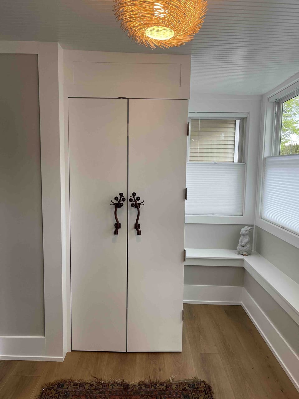 Entrance room of porch with stack washer dryer