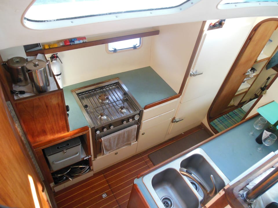 Full galley for gourmet meals. 2 freezers, fridge, 3 burner stove,  deep sink.