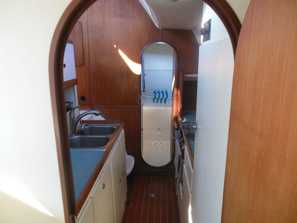 From stateroom thru galley to head. 