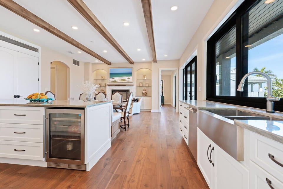 Kitchen with bench seating and eight (8) chairs
