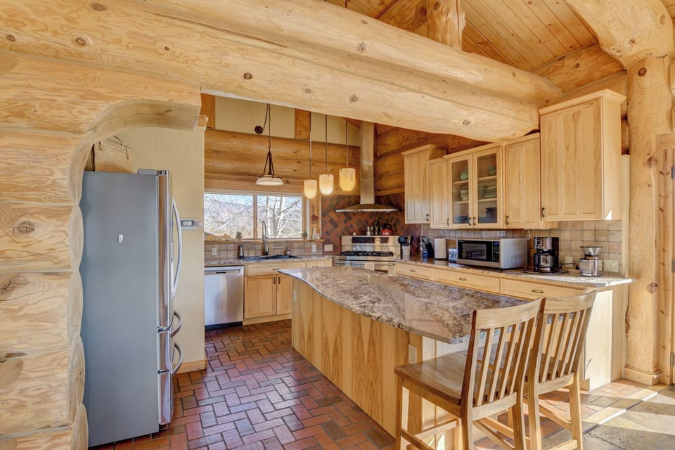 Large kitchen with granite countertops