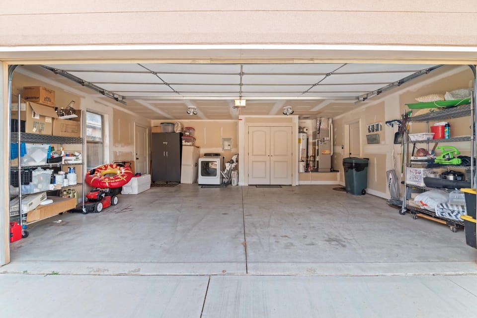 Two car garage; laundry closet with two dryers. Supplies provided. 