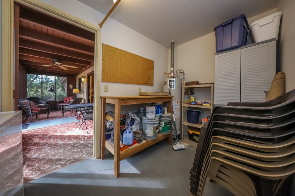 Laundry room looking out to the Arizona Room.  (Extra patio chairs too!)