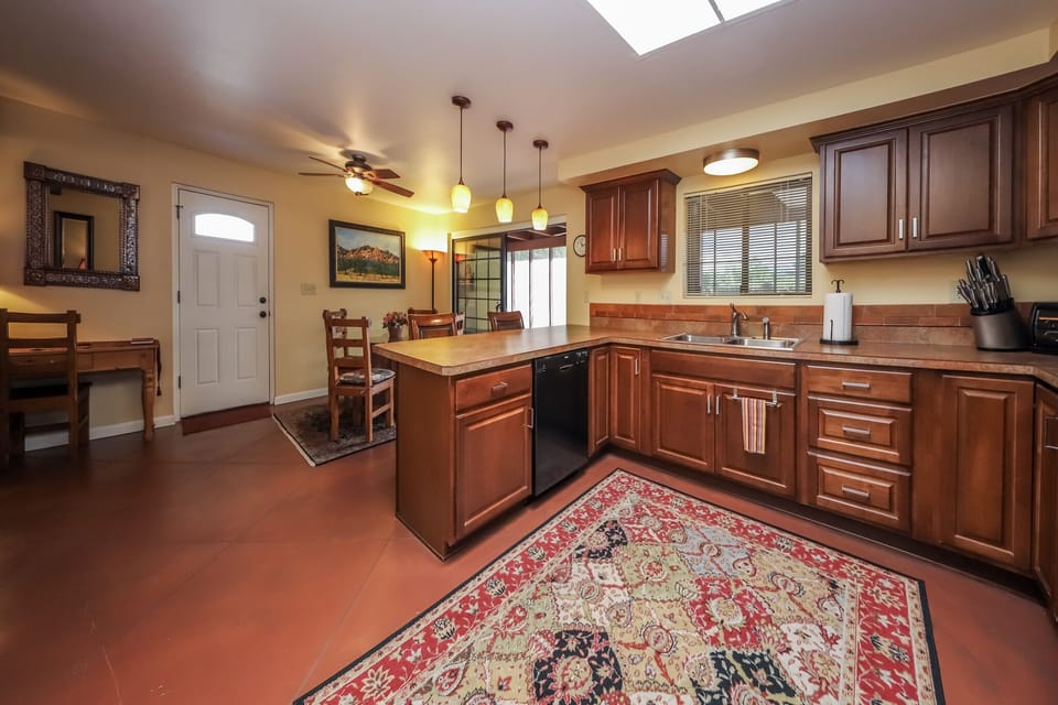 View from the kitchen into the dining area (the door is to the carport).