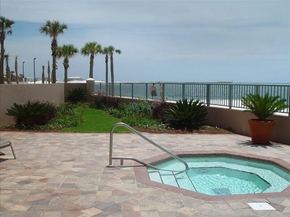 Enjoy the hot tub overlooking the Gulf and beautifully landscaped garden.
