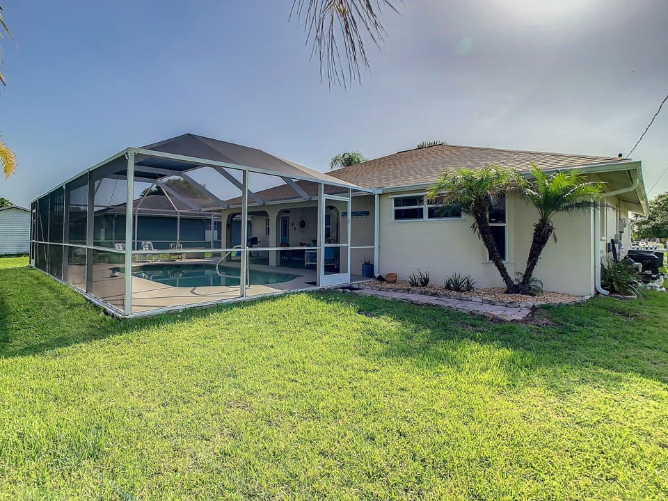 Rear garden and lanai view