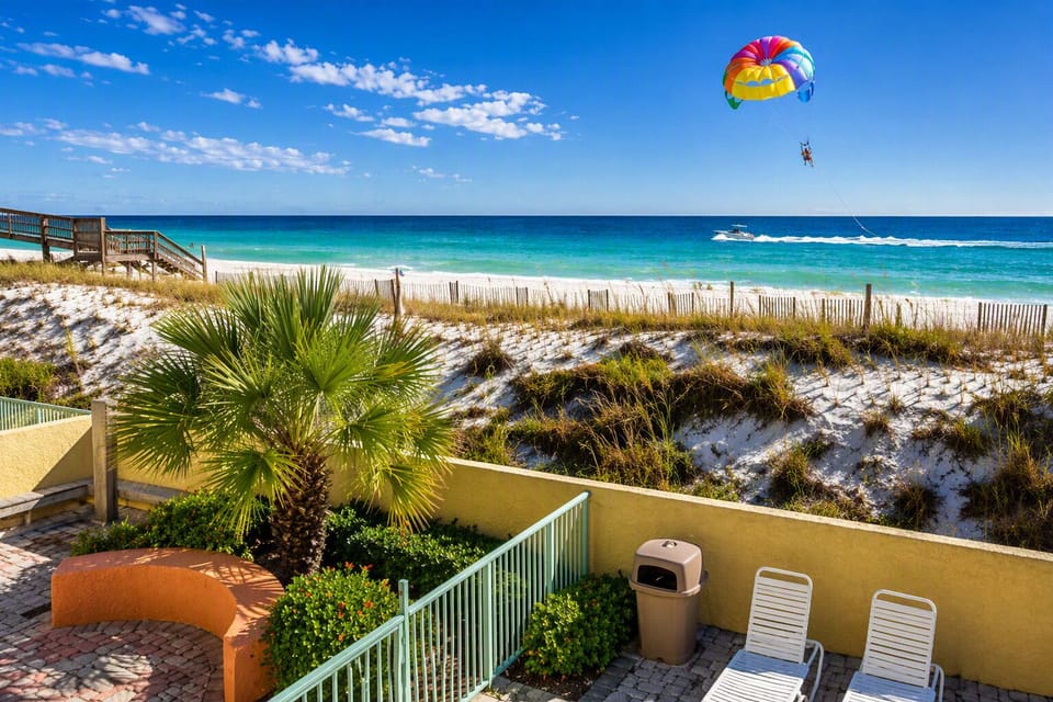 Take in breathtaking Gulf views while parasailers soar above the crystal-clear waters