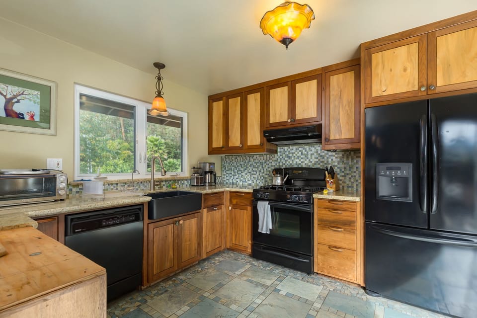 Walnut Cabinets with Maple inserts.