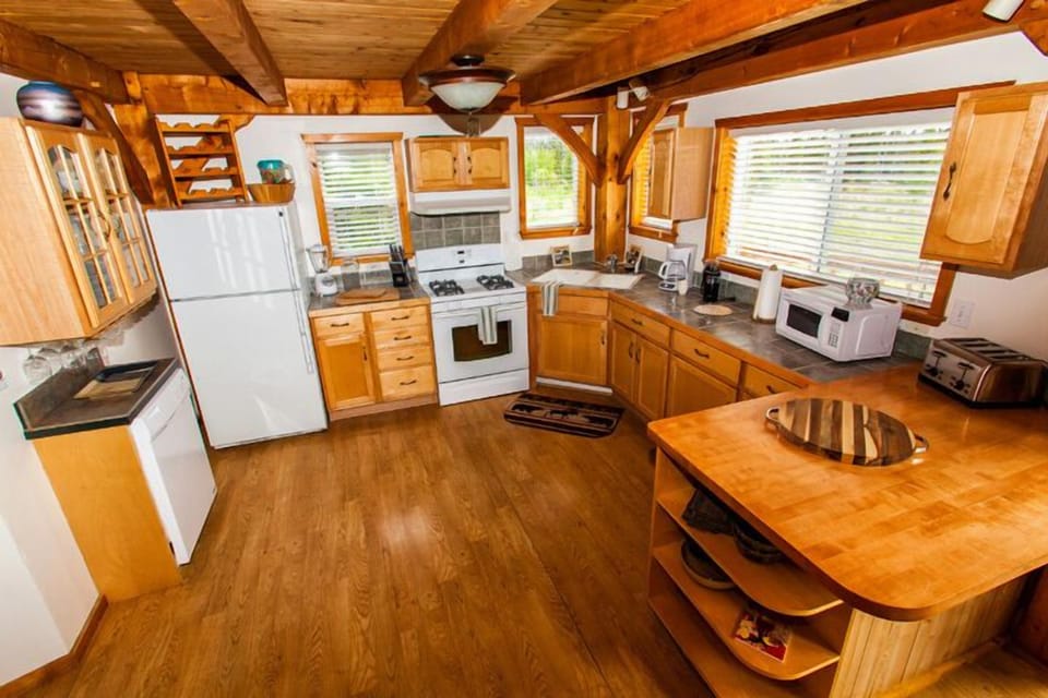 Kitchen with spacious counters and amenities.