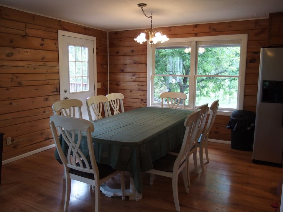 Dining room table seats 8 comfortably