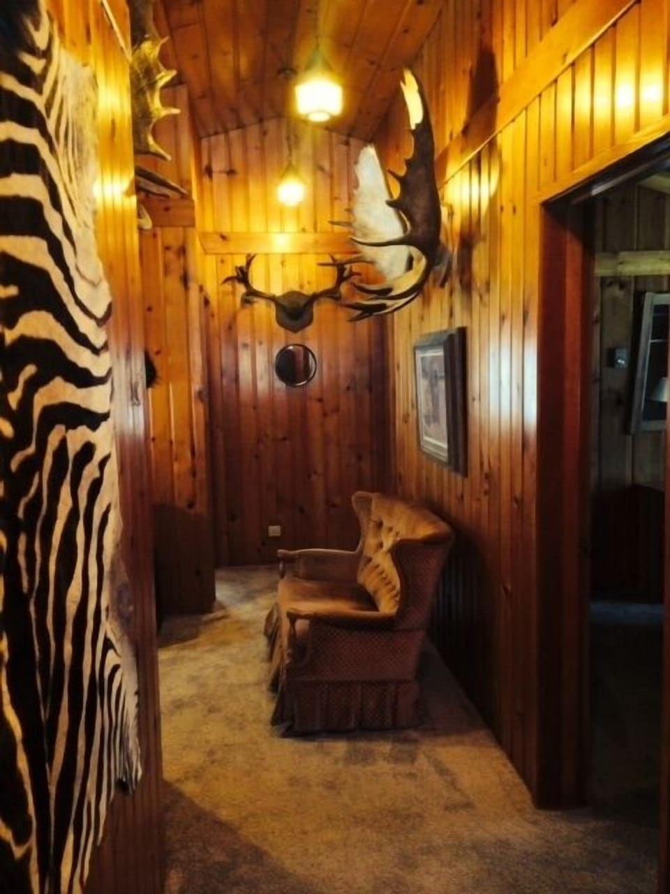 The bedrooms and kitchen are off this hall.