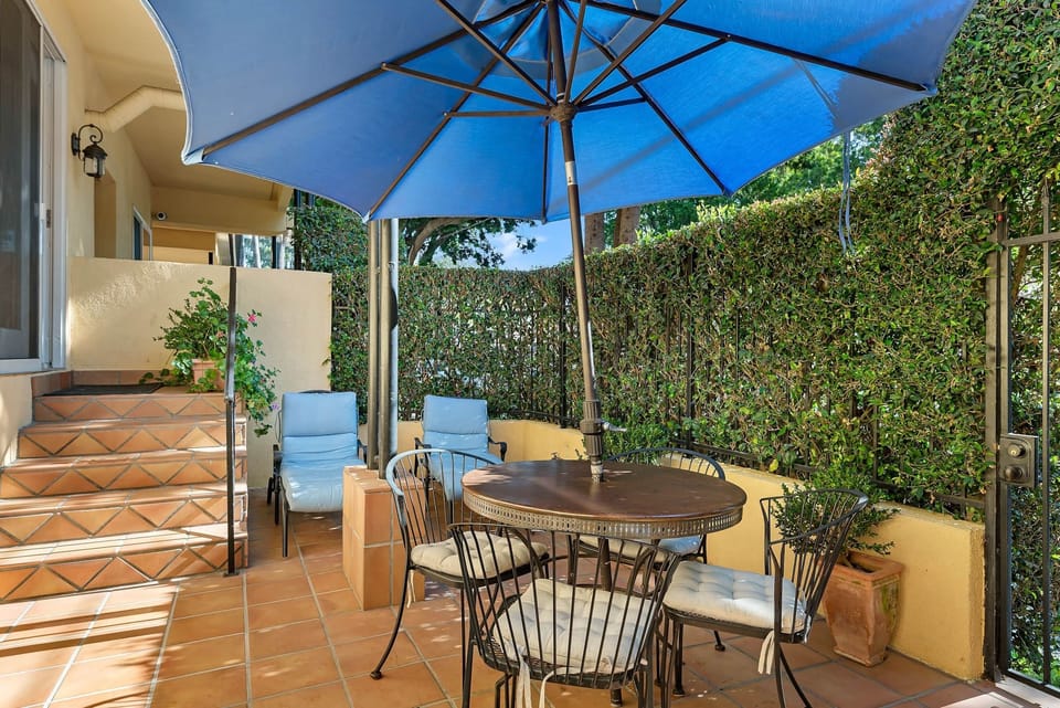 Secluded courtyard perfect for grilling and alfresco dining.