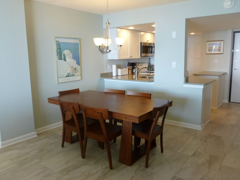 View from dining room. New porcelain floors and quartz counter tops.