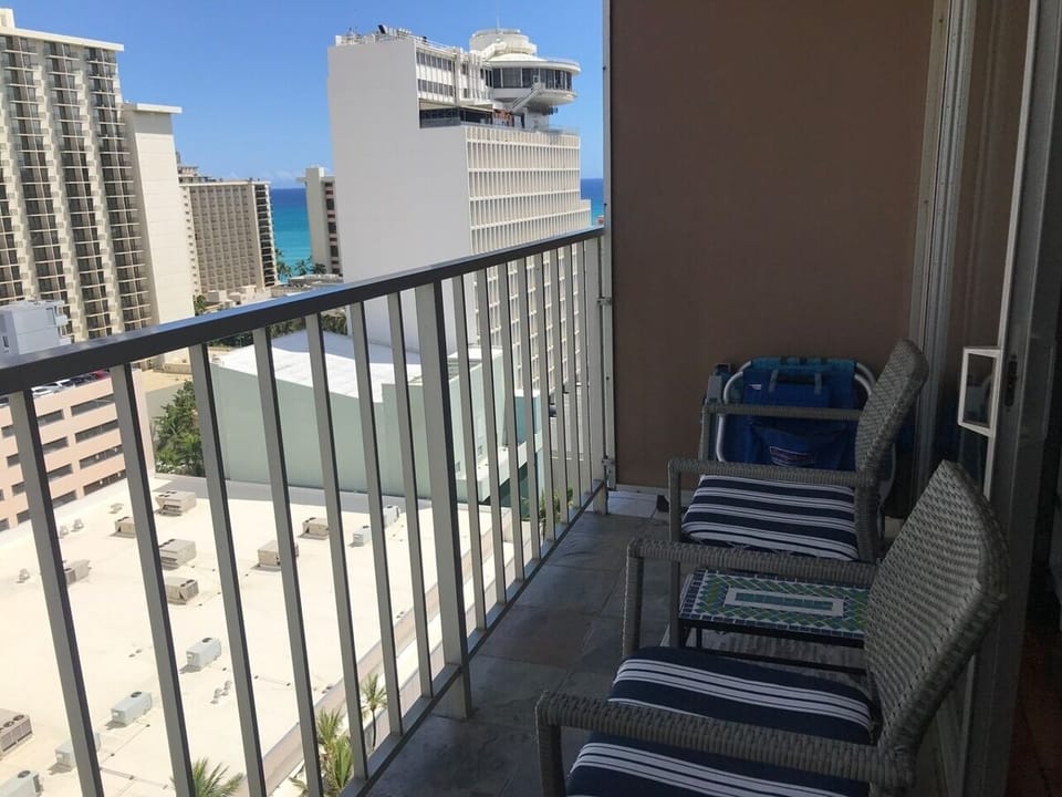 View of Waikiki Beach/ocean.  Outdoor seating area.
