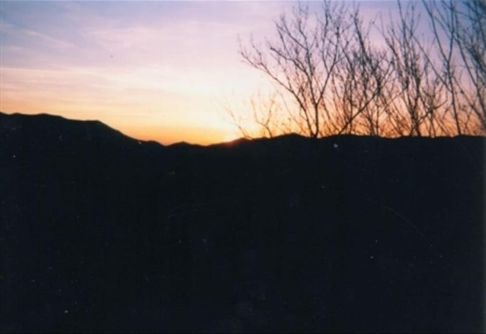 Winter sunset over Nantahala Range as seen from deck.