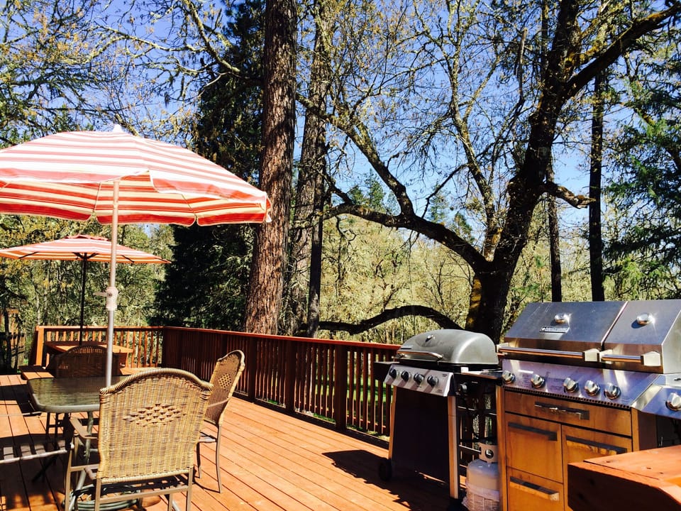 Enjoy gathering outside on the huge 16x40ft deck overlooking the river. 2 grills