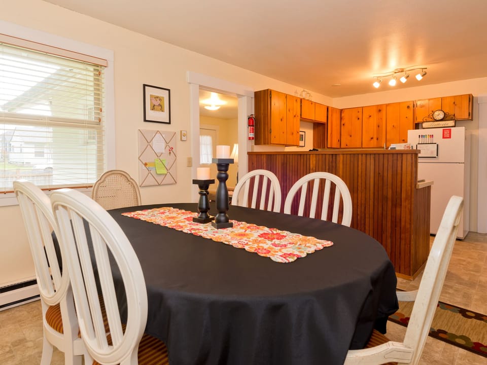 Dining Area, seats 6+, off of fully stocked kitchen with stove and refrigerator 