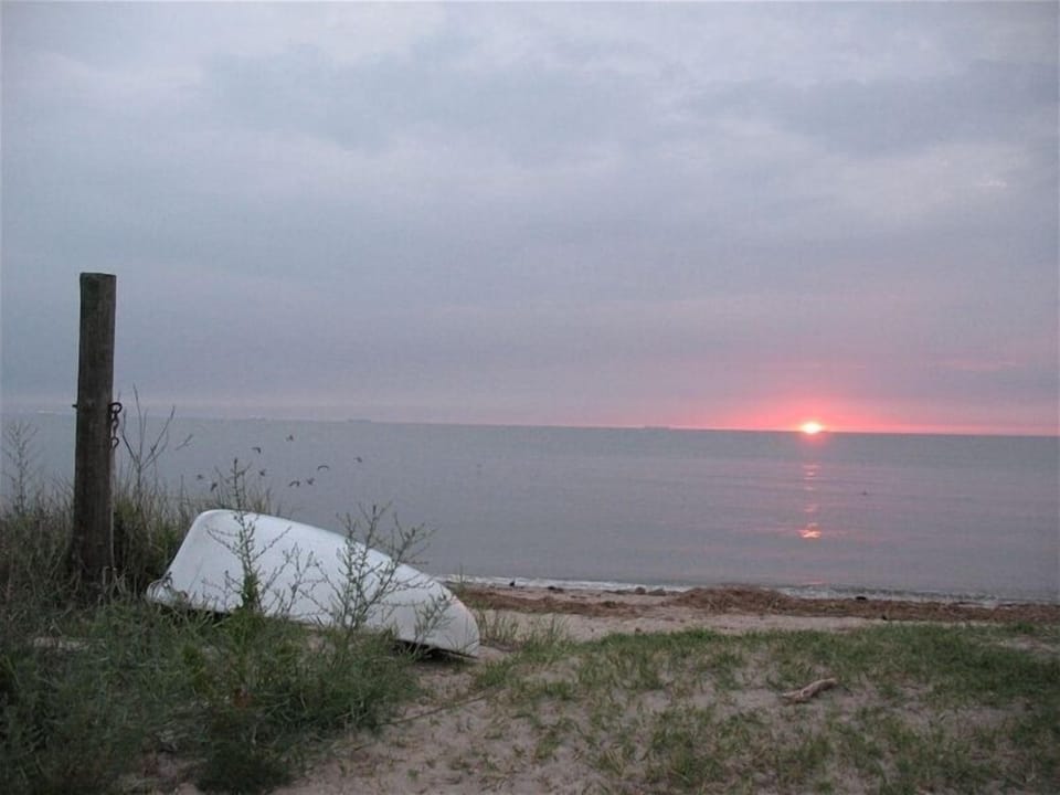 Sunrise - Cottage is immediately to left.