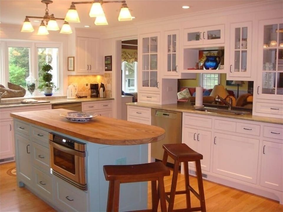 Kitchen with family room on other side of cabinets.