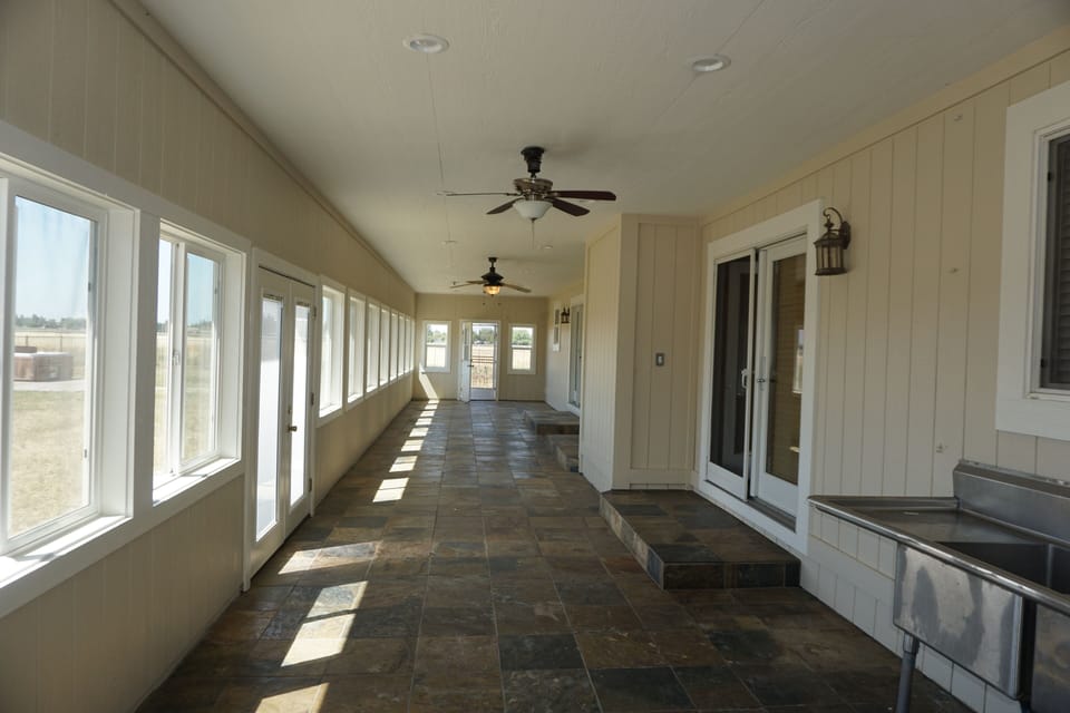 covered patio good for games, gathering, food, indoor event etc