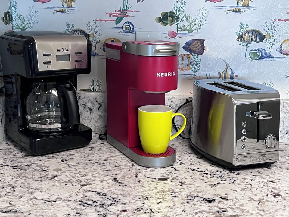 Drip coffee maker and a Keurig pod coffee maker