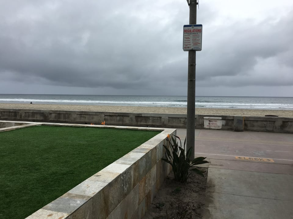 BEACH IN FRONT OF COURT