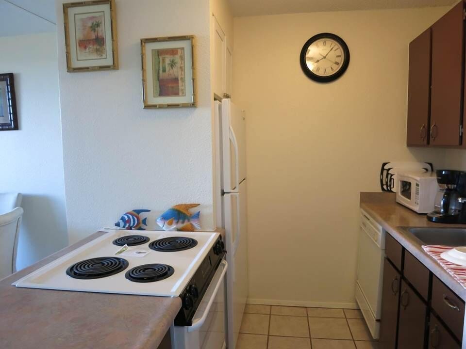 Kitchen with full refrigerator/freezer, stove, oven, dishwasher