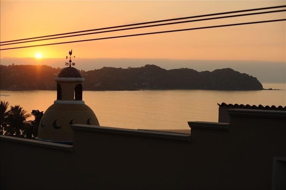 Sunset from the terrace.....with a nice glass of wine.