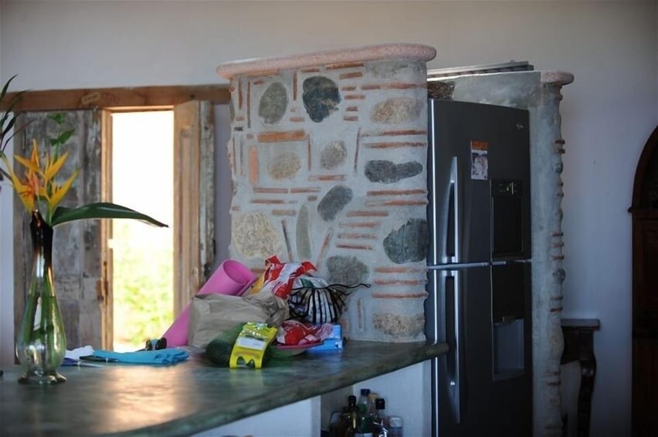Kitchen with brand new fridge and cappuchino maker