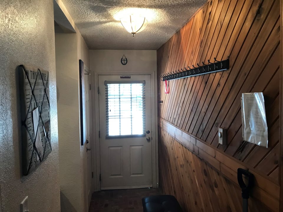 Hallway with plenty of Hanging Space for Ski Gear etc.