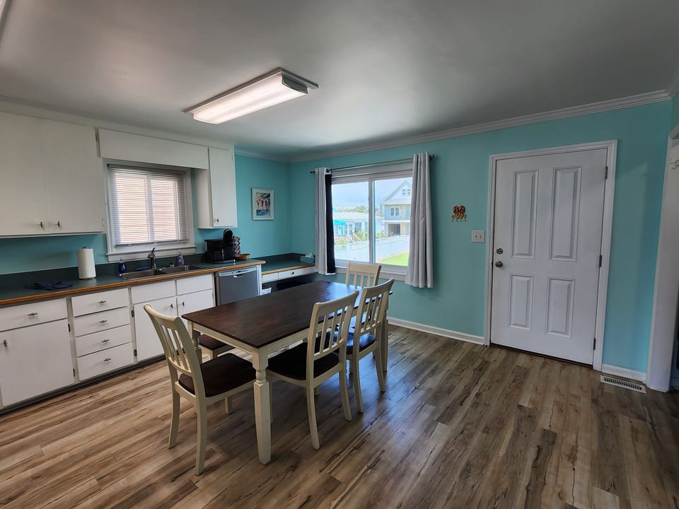 view of kitchen and entrance door