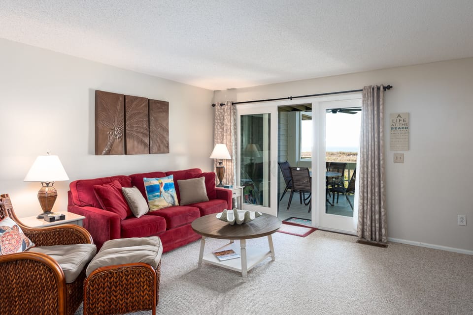 Sliders lead from the great room to the deck with amazing views!