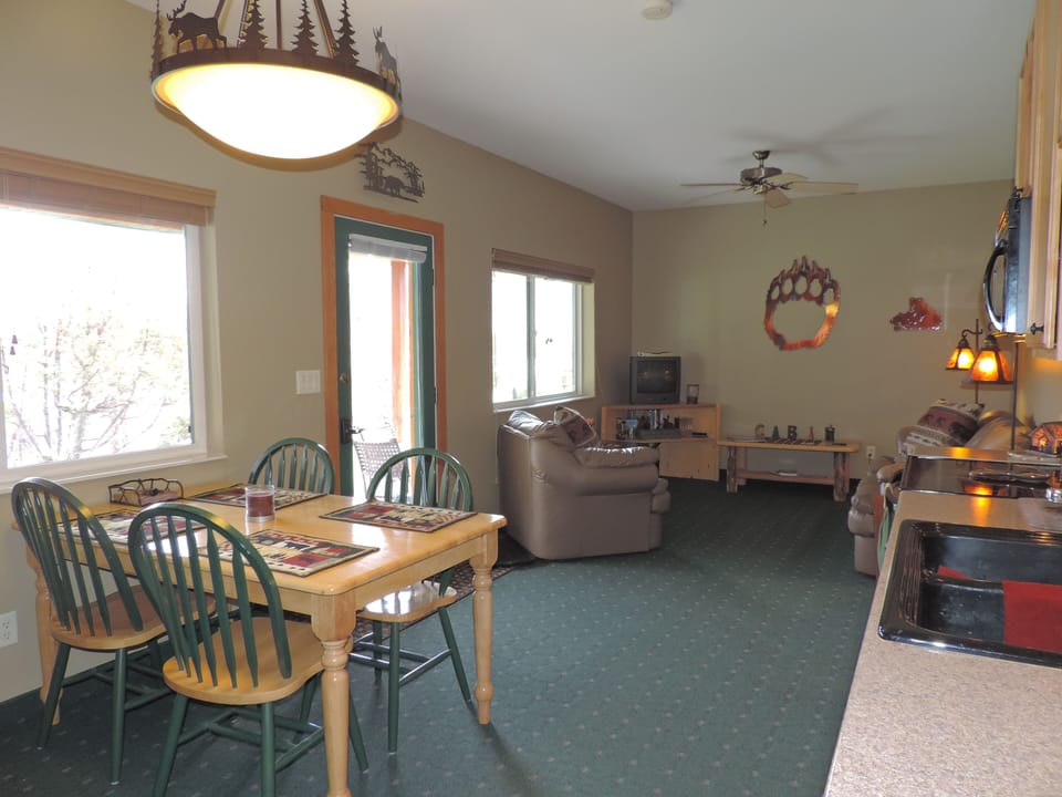 Walk-out to patio with gas and electric grills for guest use.