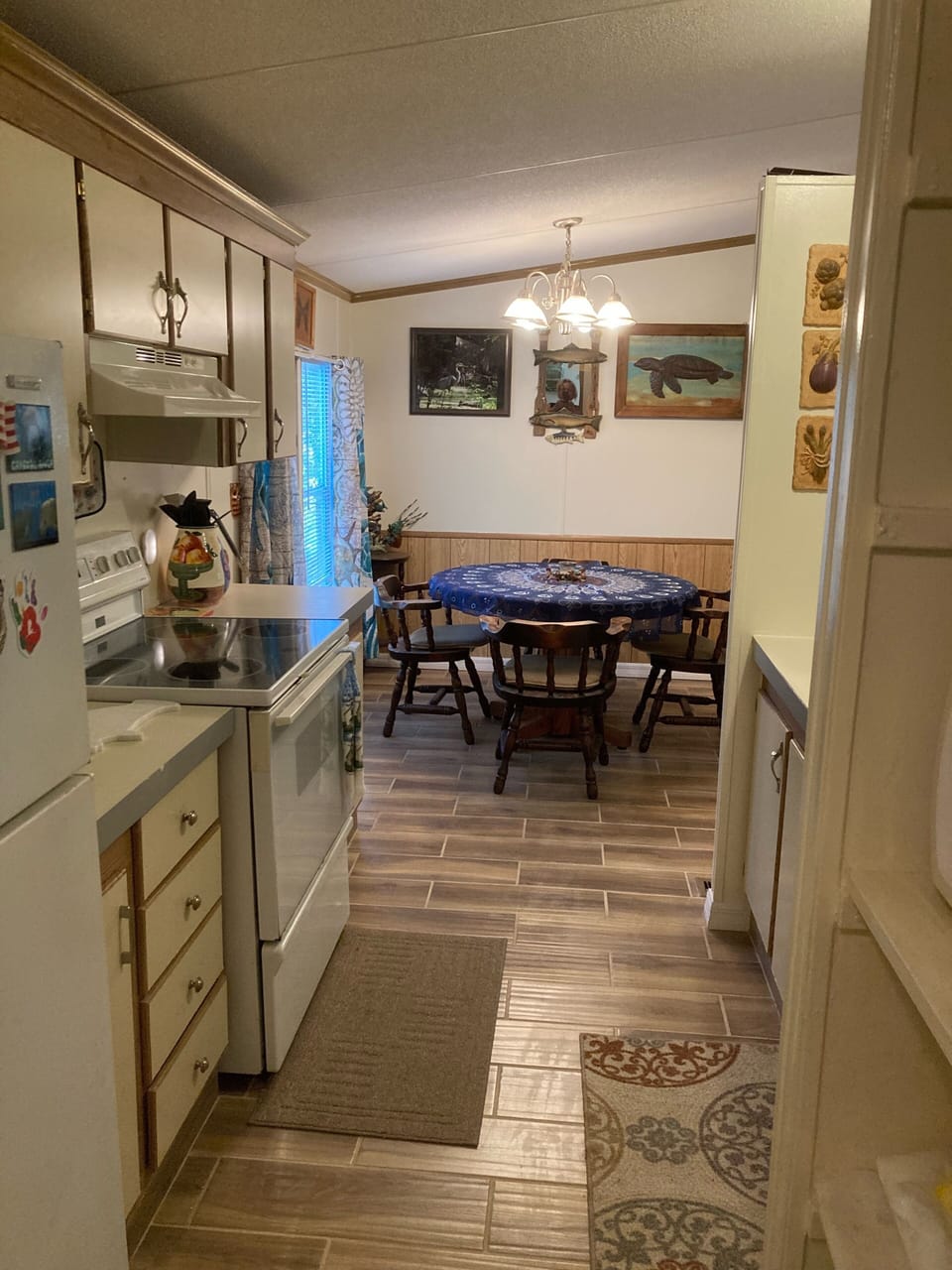 Kitchen showing dining area. 