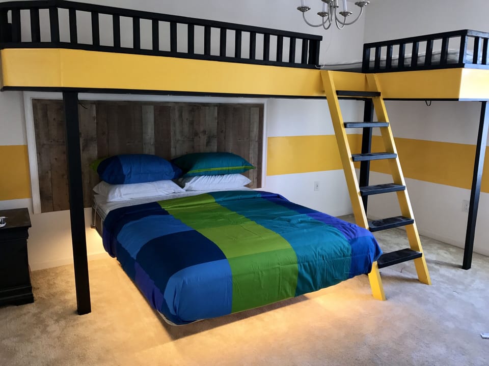Boy bedroom, got Queen bed, 2 single bed on the top bunk. special lighting too. 