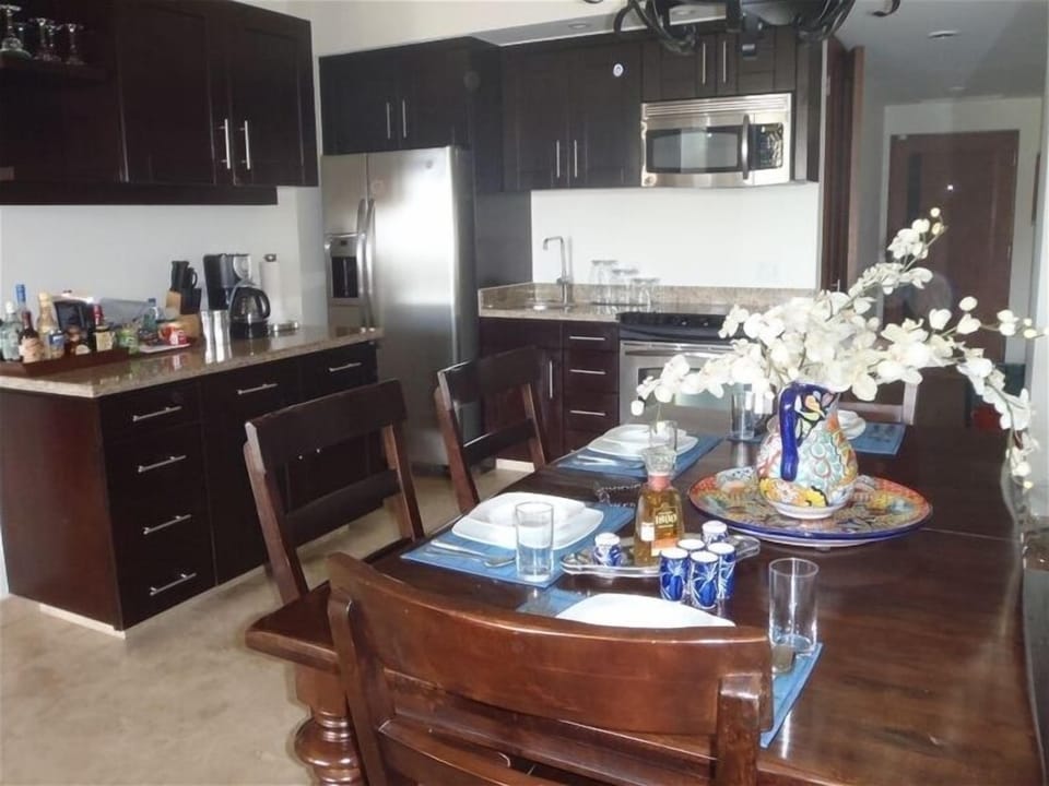 Full Kitchen and Dining Area
Leave the Dishes, you have a Maid!!
