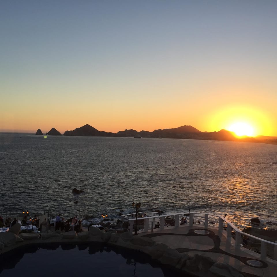 Sunset at Mona Lisa Restaurant looking back at Cabo San Lucas, a must see!