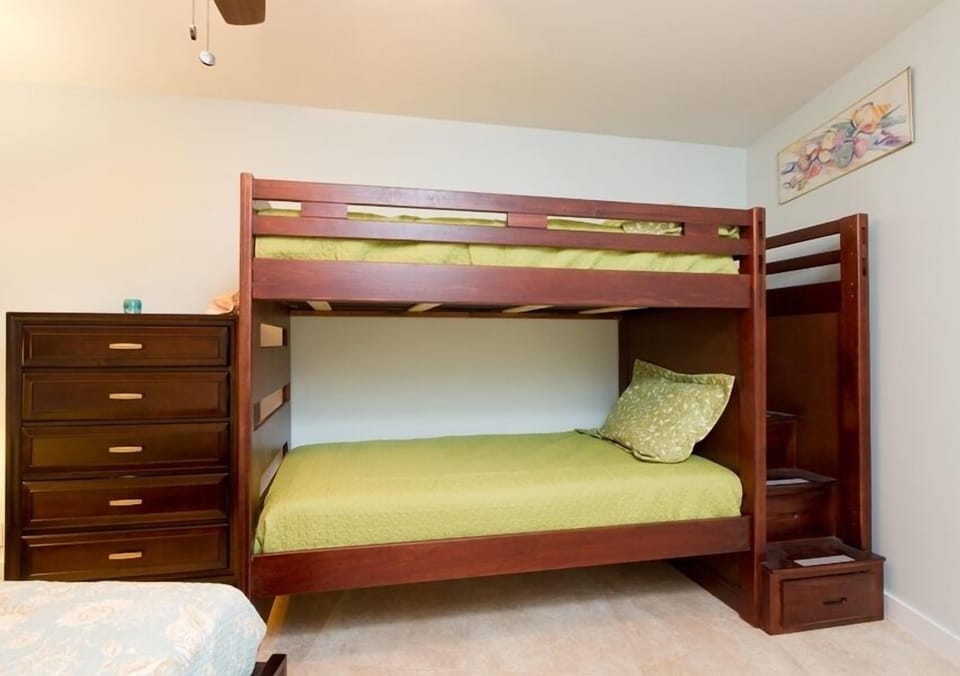Bunk bed features stairs, not a ladder for your comfort.