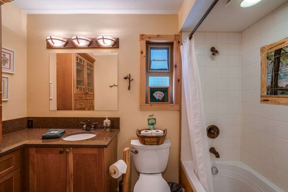 Main floor bathroom, has a deep soaking tub.  Bring your  soaking essentials!