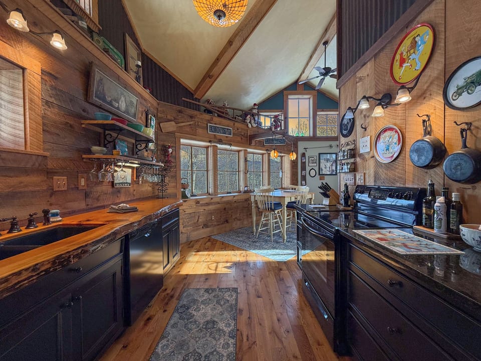 Our custom kitchen features live-edge wood countertops + a unique vintage vibe 