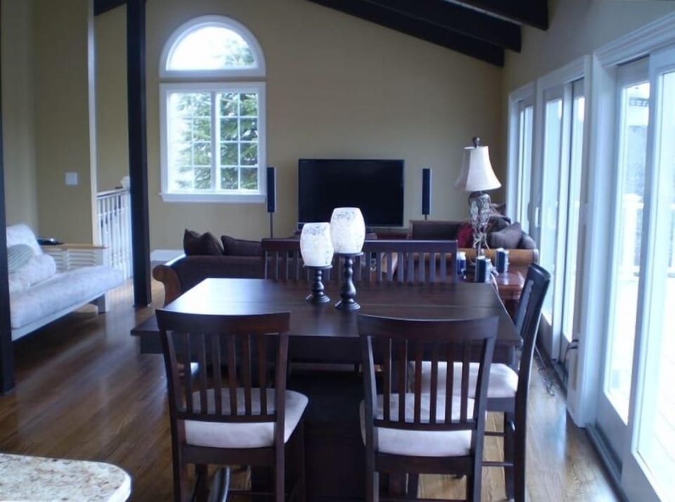 Fine decor with Plasma and surround Sound leading to outside
