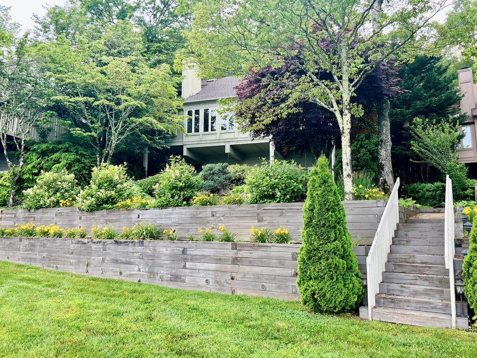 View of house from lake. Private backyard.