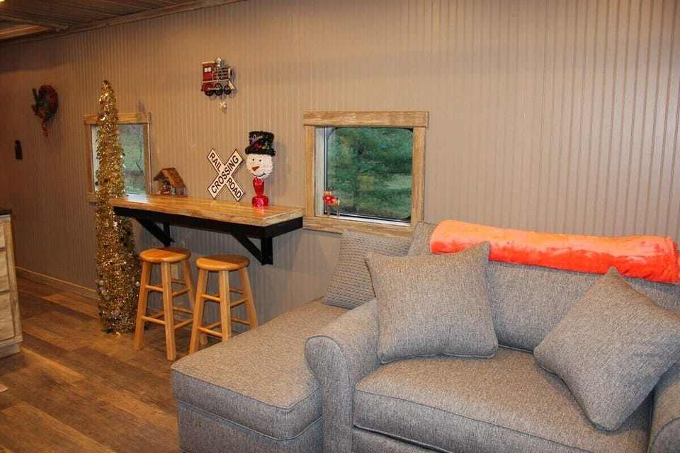 Couch pulls out to a twin bed.